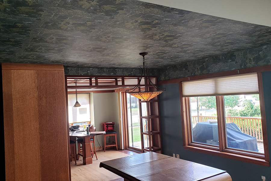room-with-wall-paper-on-ceiling-and-top-part-of-wall-roseville-mi